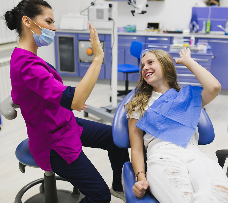 Dentist and patient handshake for friendship and respect